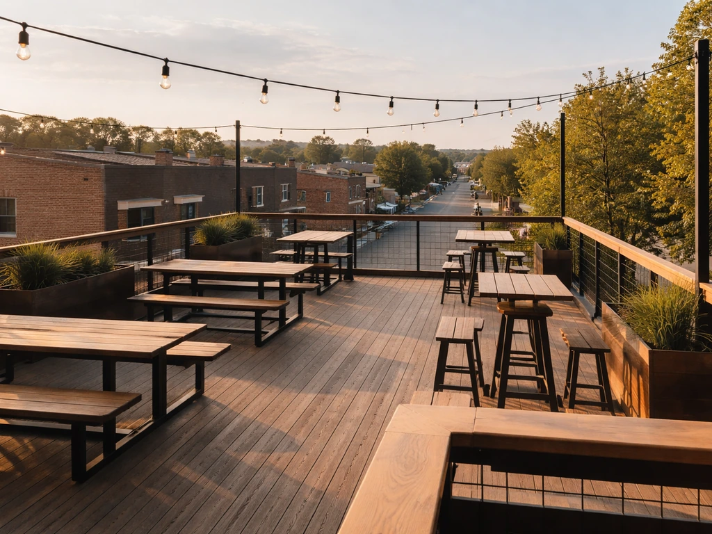 Elevated view from a rooftop deck looking over the Delano district rooftops and streets.